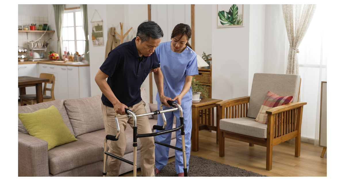 A home-based neurological physiotherapist doing a physiotherapy session with a post-stroke patient.